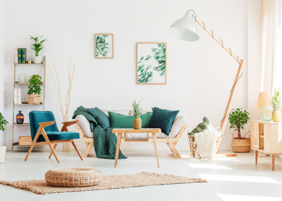 A living room decorated in modern, light wood furniture