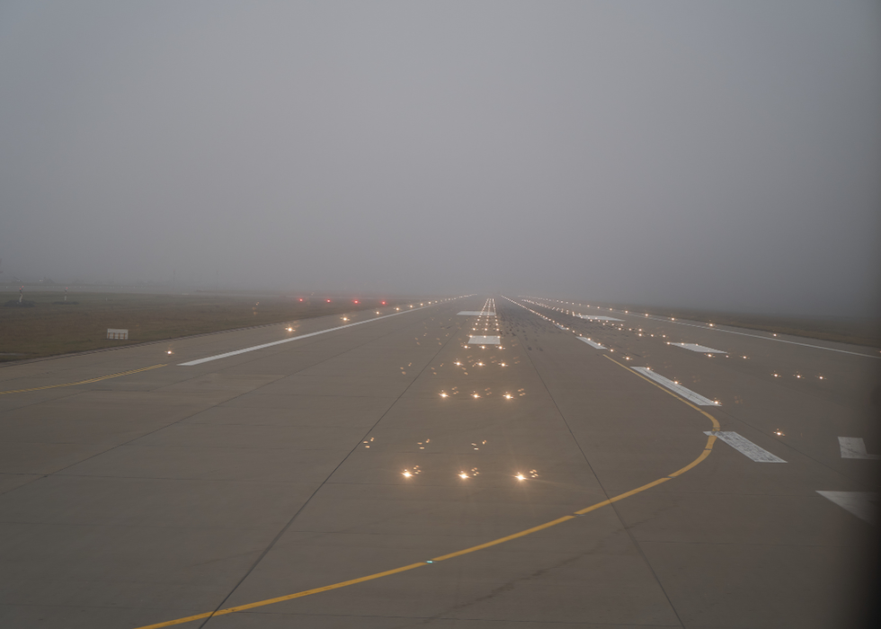 An airport runway at night