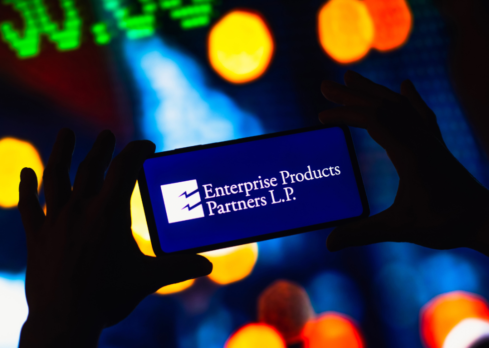 The Enterprise Products Partners logo is displayed on a smartphone screen.