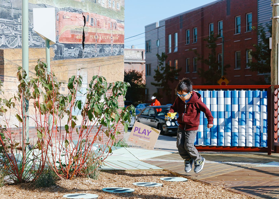 A child plays at the Urban Thinkscape installation in west Philadelphia’s Belmont neighborhood 