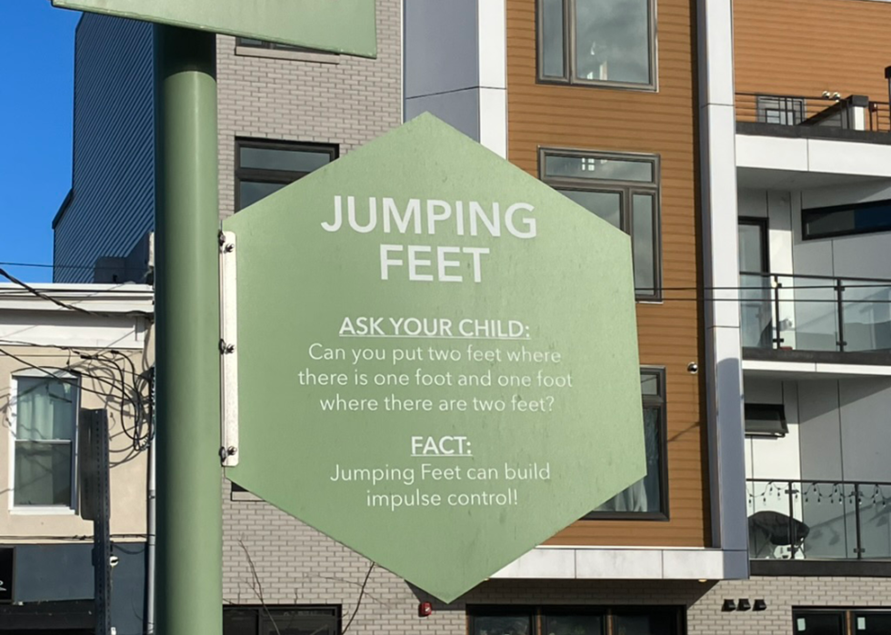 A sign at Philadelphia’s Urban Thinkscape guides players to try an alternate version of hopscotch that promotes executive functioning skills.