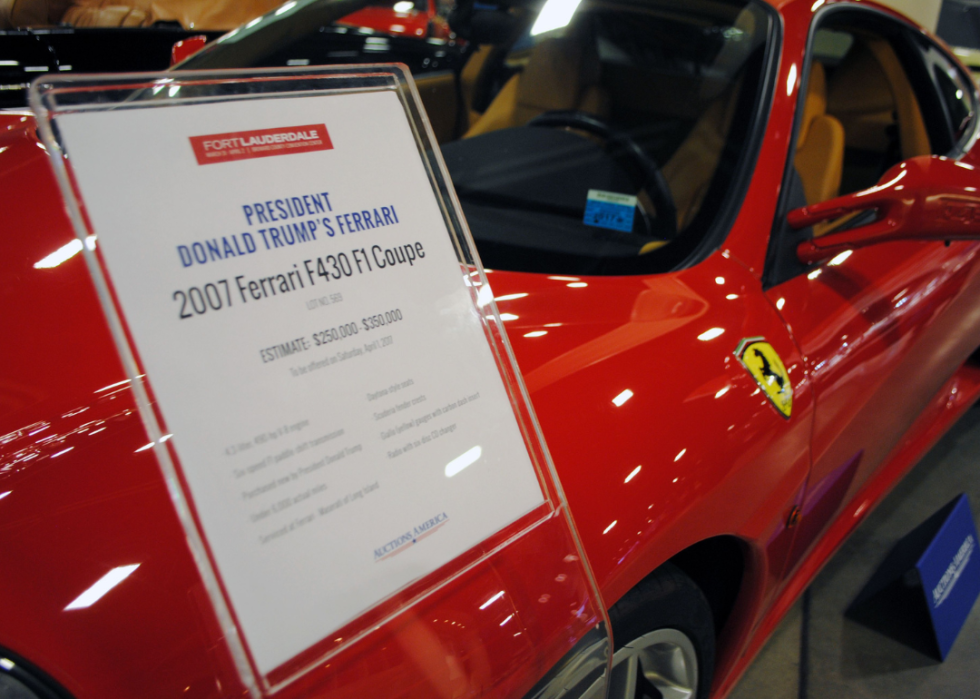 A Ferrari F430 owned by US president Donald J. Trump in 2007 is exhibited by Autcions America in Fort Lauderdale, Florida on March 31, 2017. 