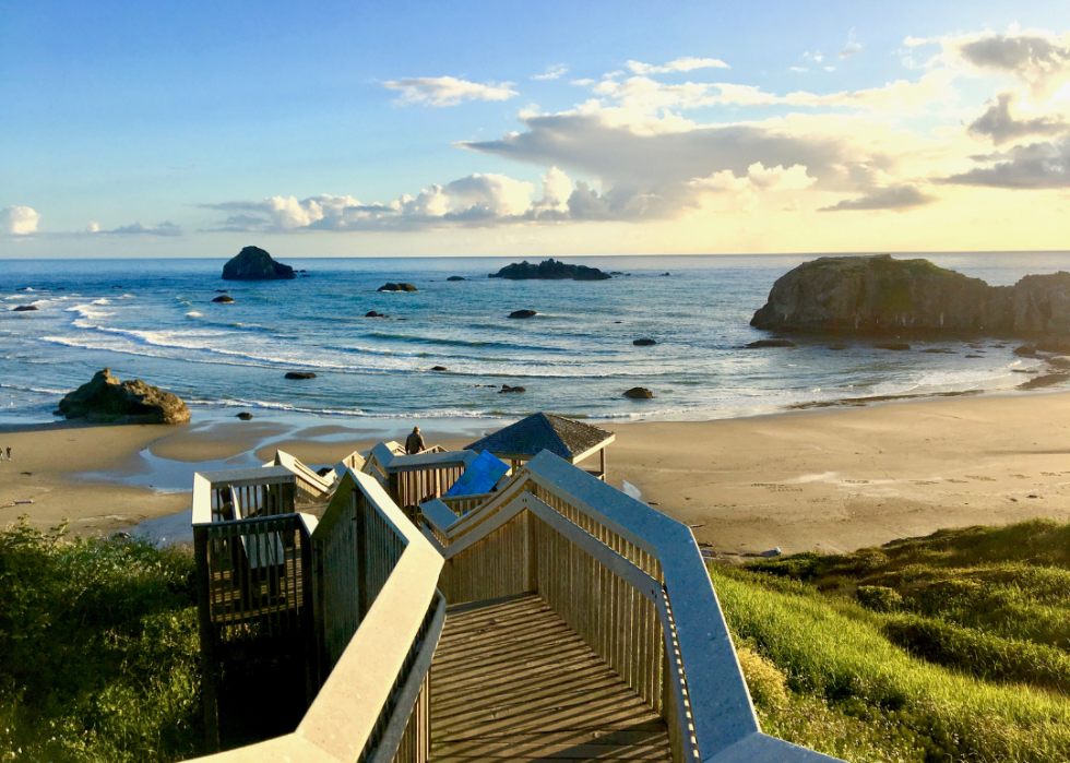 Stairway leading down to rocky beach at Coquille Point in Bandon, Oregon