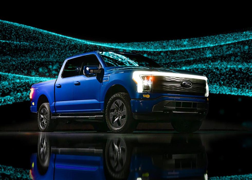 blue Ford-150 Lightning against sparkly background