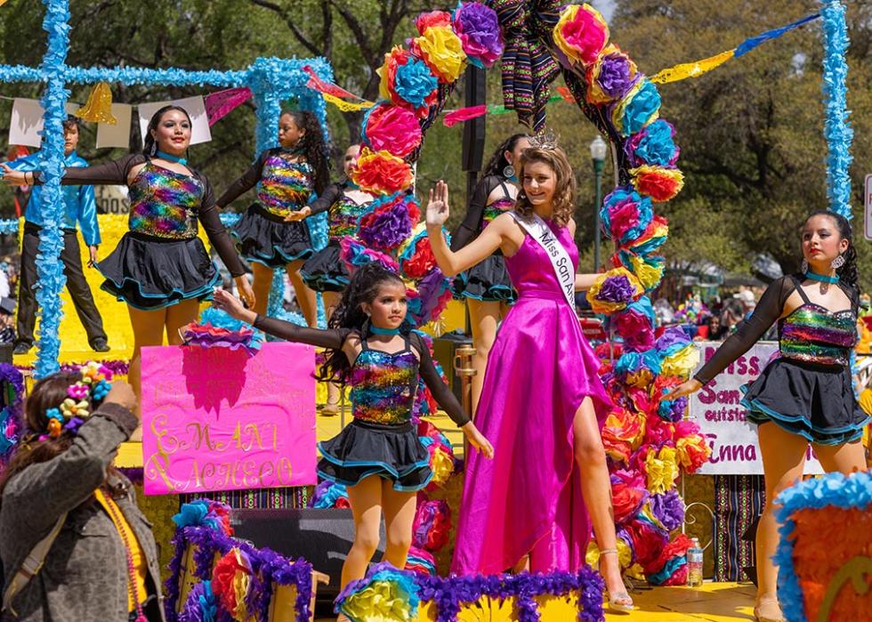 The Battle of the Flowers Parade float carrying Miss San Antonio