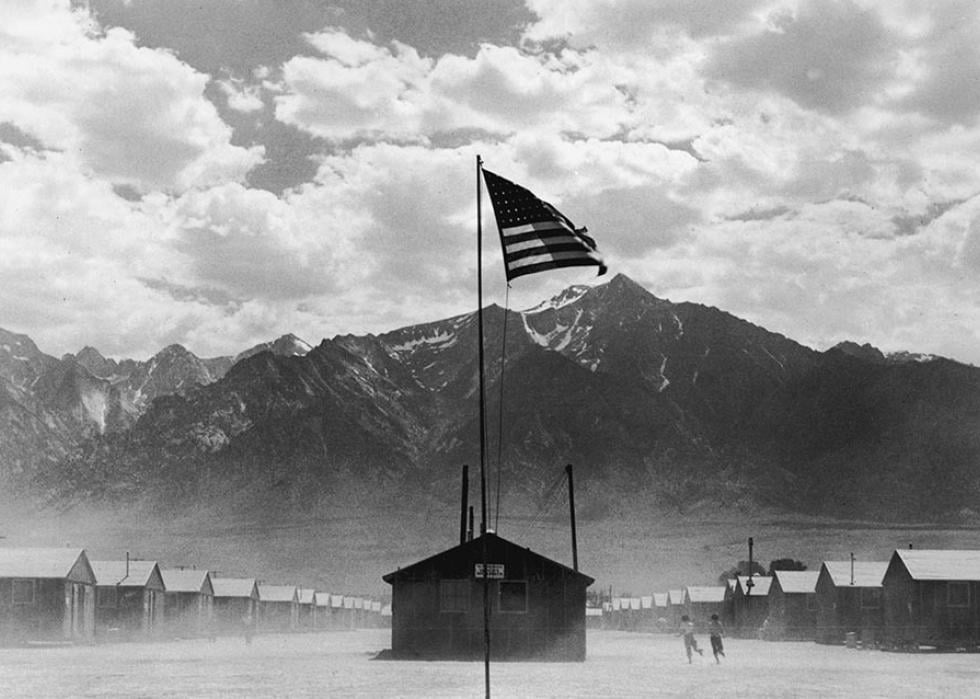 A US flag flies at the Manzanar War Relocation Center, a Japanese-American internment camp, in Manzanar, California, World War II, 3rd July 1942 site of a detention facility for some of the 120,000 Japanese Americans. 