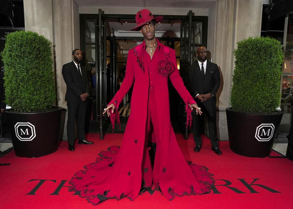 Wisdom Kaye wearing all red departs The Mark Hotel for 2024 Met Gala on May 06, 2024