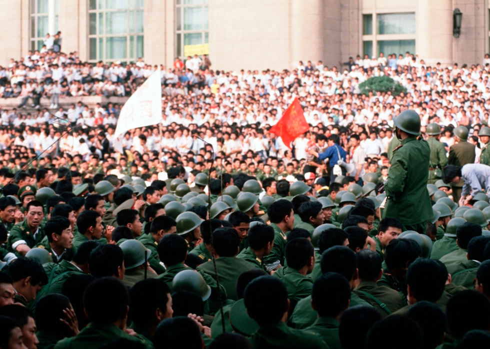Calm crowds fill Tiananmen Square.