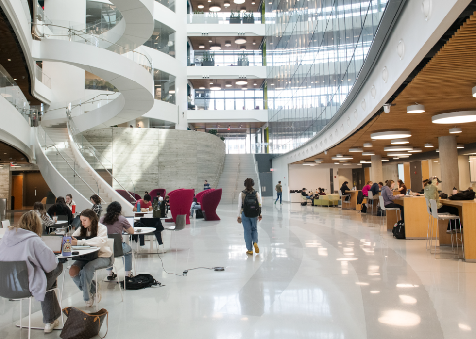 Student life inside the atrium of the Interdisciplinary Science and Engineering Complex, or ISEC, on the campus of Northeastern University.