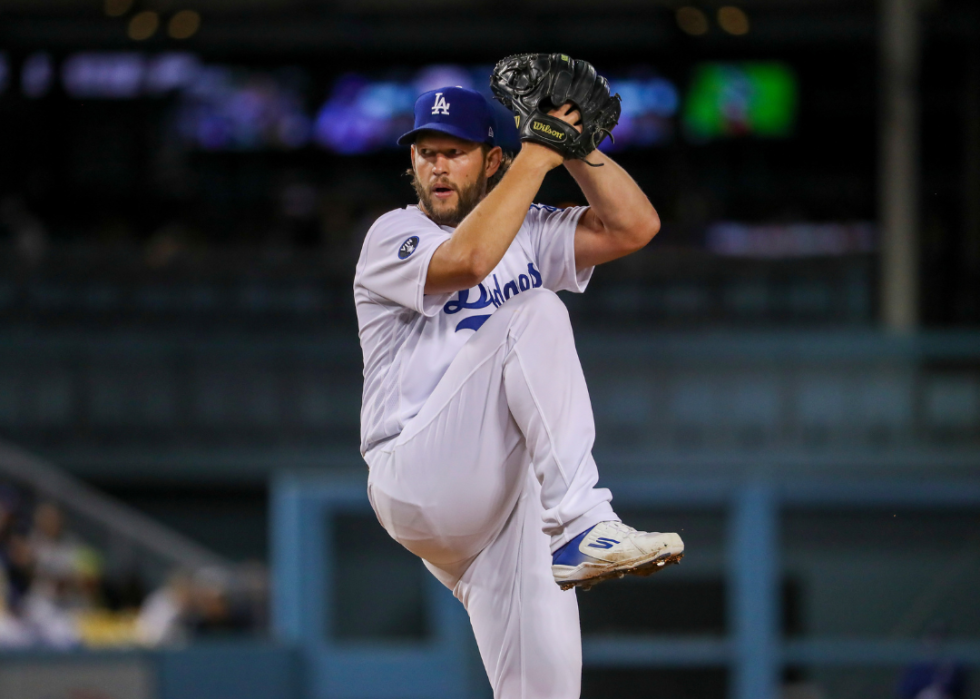 Dodgers starting pitcher Clayton Kershaw winds up as he delivers a pitch against the Diamondbacks at Dodger Stadium in Los Angeles Monday, Sept. 19, 2022.