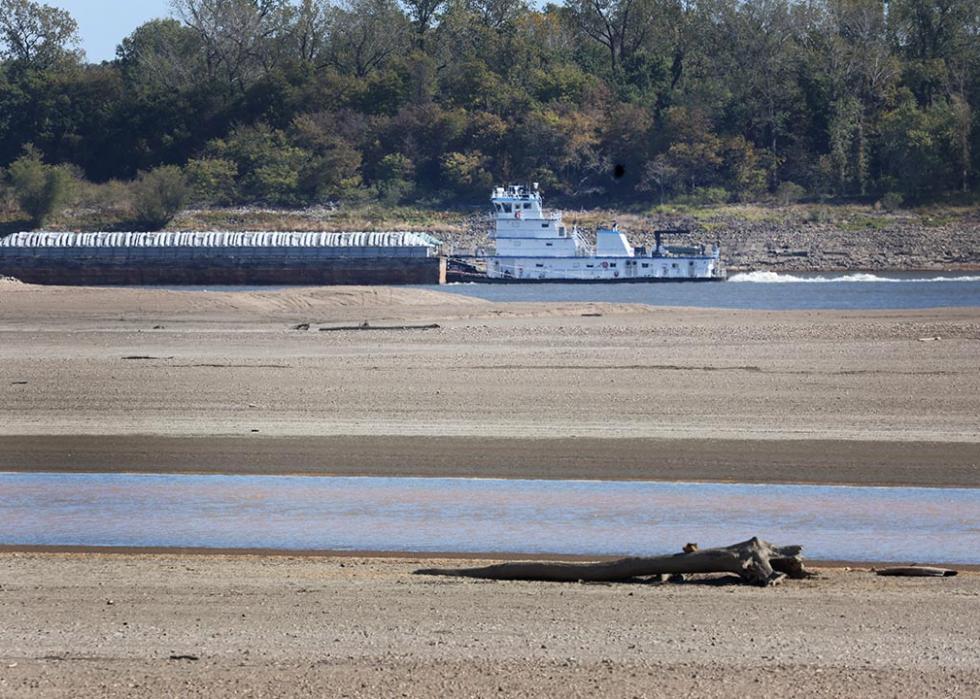 Barges are pushed up the Mississippi River near Portageville, Missouri. Lack of rain in the Ohio River Valley and along the Upper Mississippi has caused the Mississippi River south of the confluence of the Ohio River to reach near record low levels. 