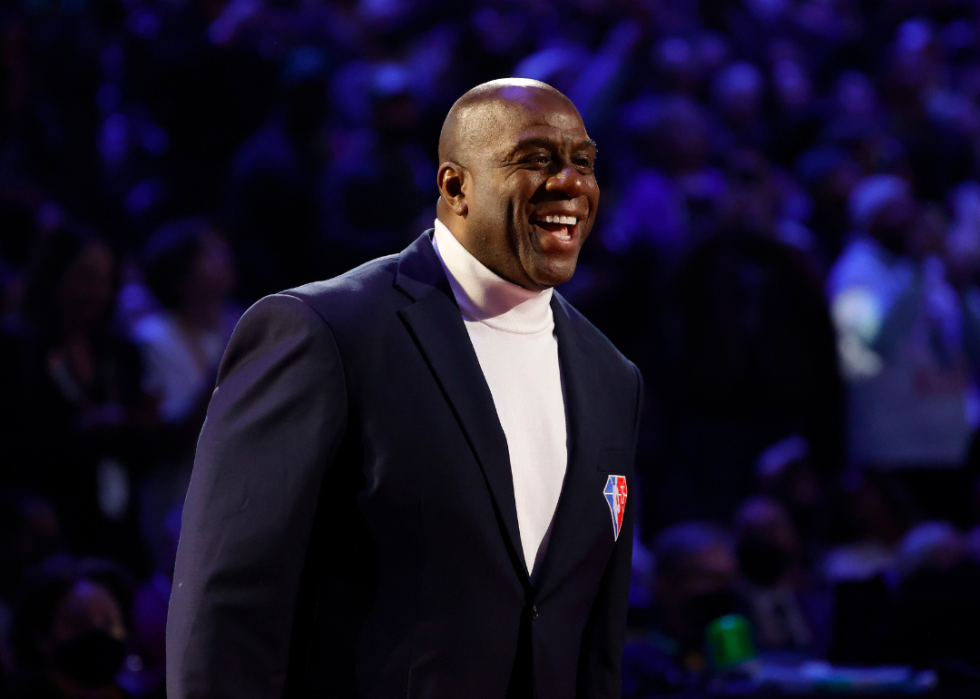 Earvin "Magic" Johnson reacts after being introduced as part of the NBA 75th Anniversary Team during the 2022 NBA All-Star Game at Rocket Mortgage Fieldhouse on February 20, 2022 in Cleveland, Ohio.