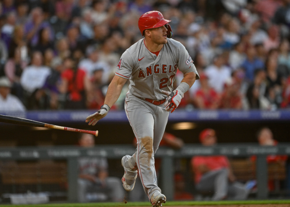 Mike Trout #27 of the Los Angeles Angels watches the flight of a third inning solo homerun in a game against the Colorado Rockies at Coors Field on June 24, 2023 in Denver, Colorado.