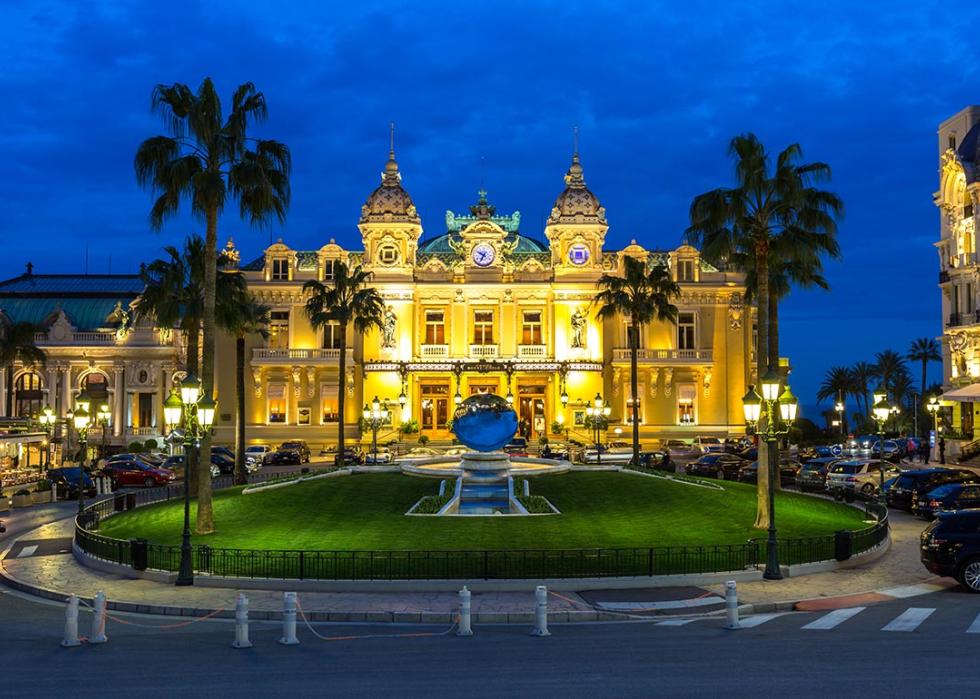 The Monte Carlo Casino, gambling and entertainment complex at twilight in Monte Carlo, Monaco, Cote de Azul.