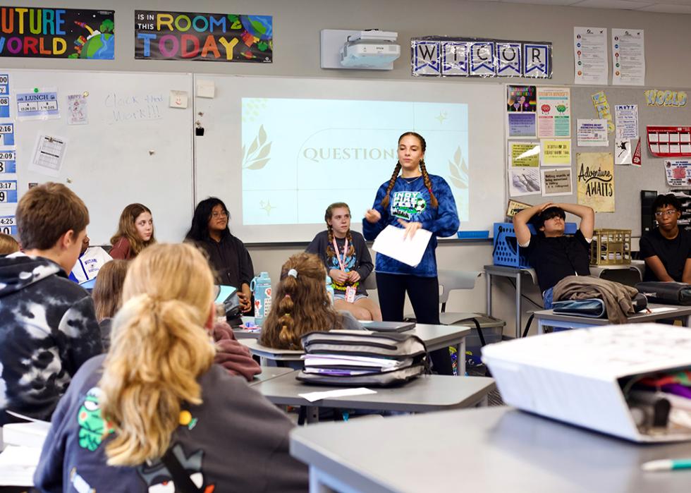 Photo showing Kevin Melrose’s eighth grade social studies class at Westlane Middle School has focused on teaching democracy through student council elections.