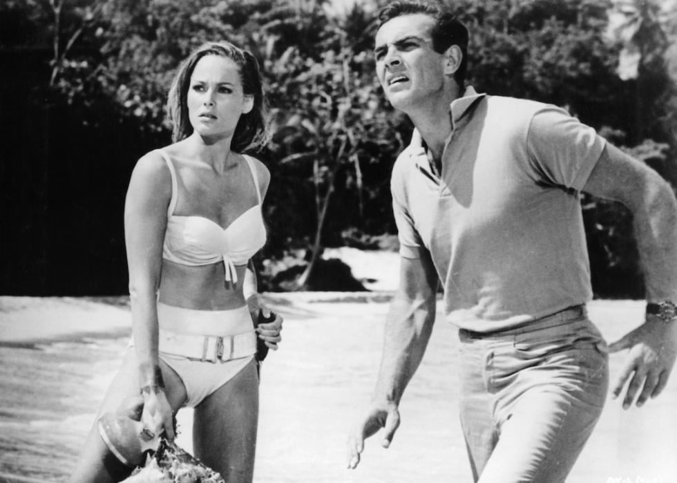 Actors Ursula Andress and Sean Connery at the beach on the set of 'Dr. No.'