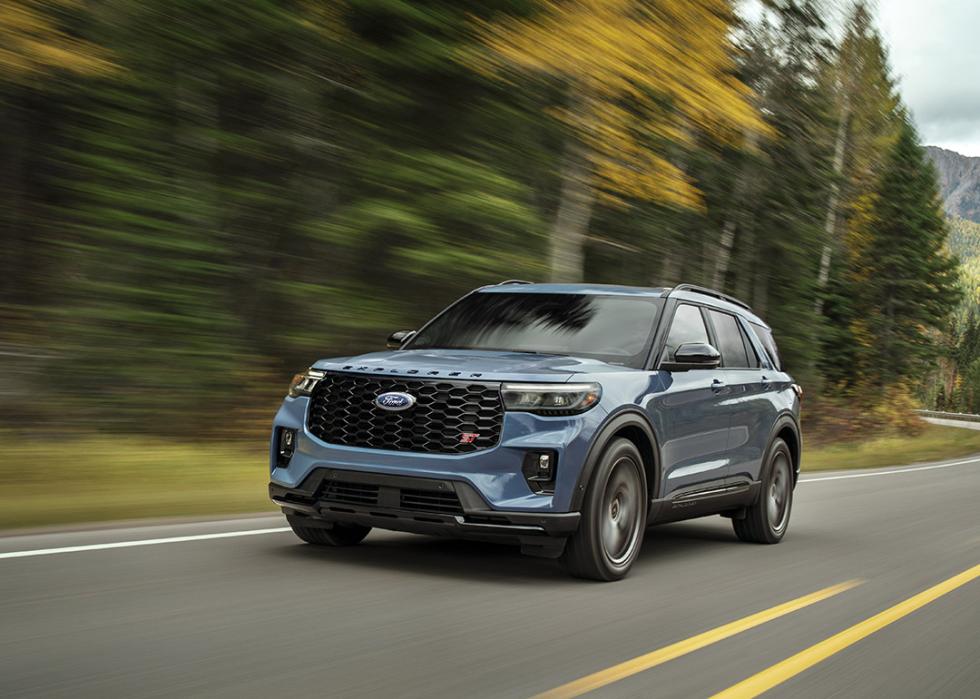 A blue 2025 Ford Explorer on the road.