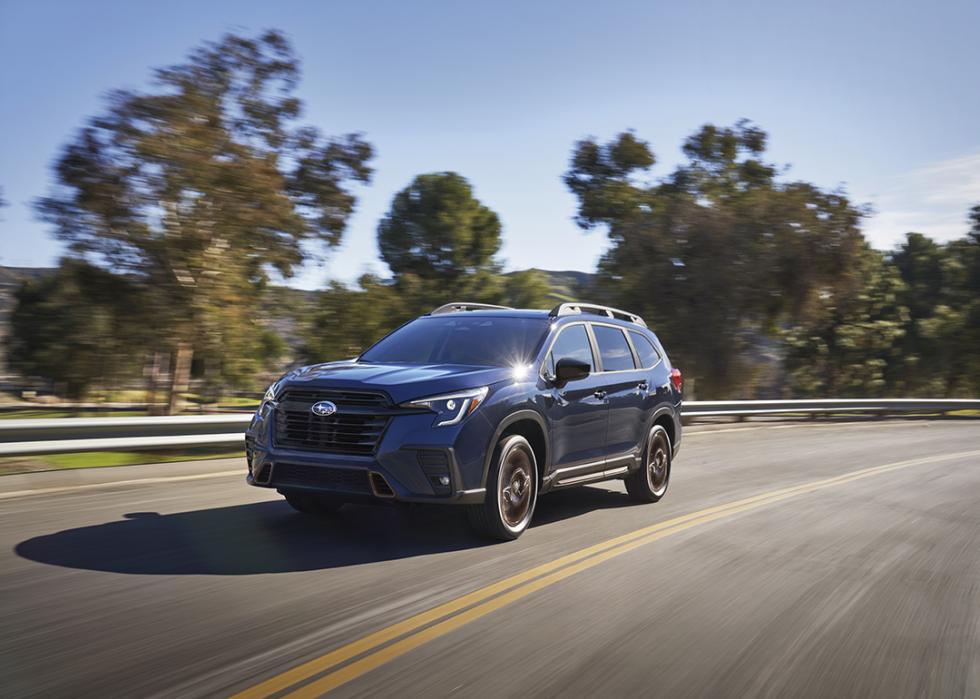 A blue 2025 Subaru Ascent on the road.