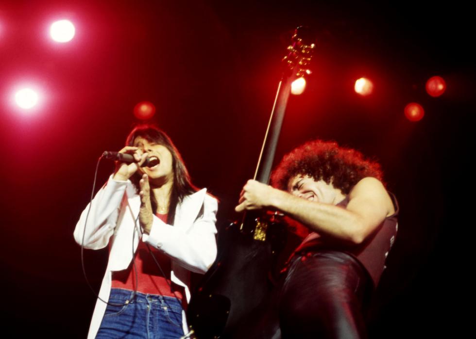 Steve Perry and Neal Schon of Journey perform during the 1980 Departure tour in Detroit, Michigan.