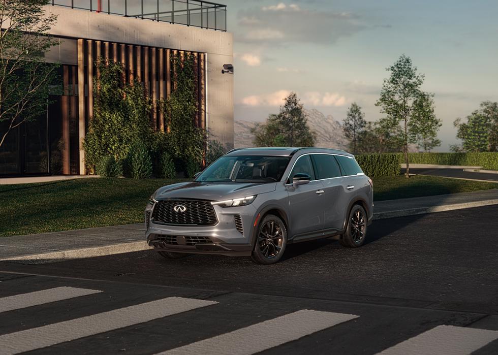 Gray Infiniti QX60 driving on the road.