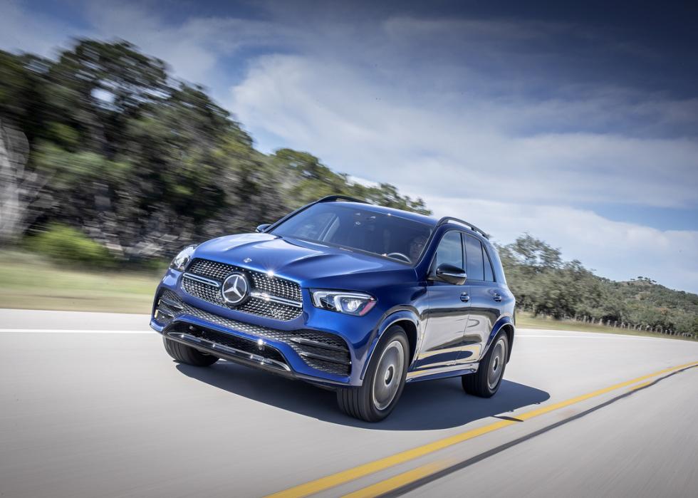 Blue Mercedes-Benz GLE 350 driving on the road.