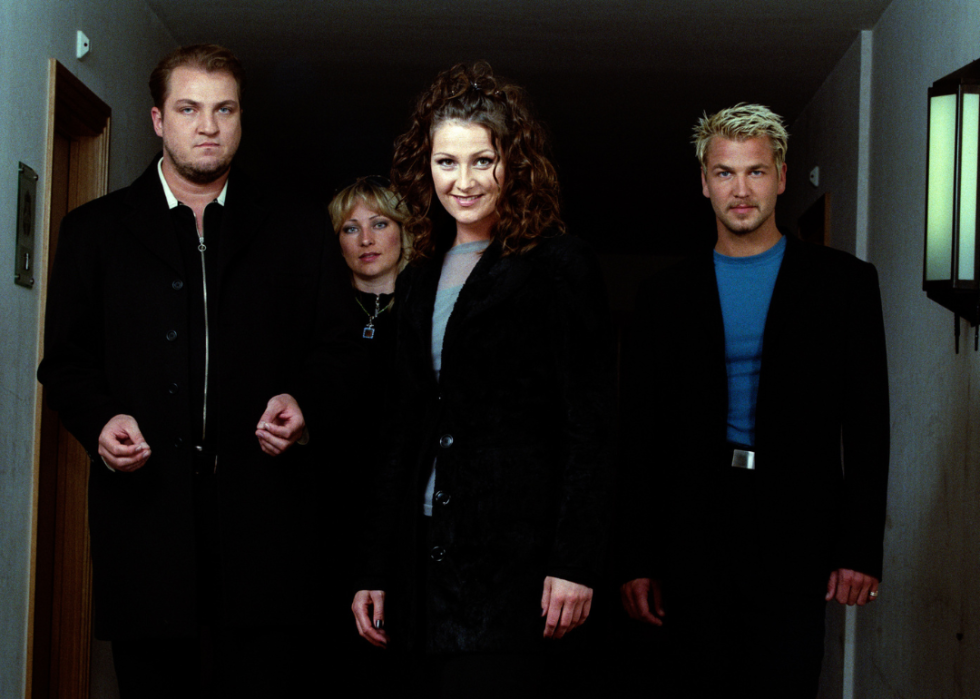 Linn Berggren along with Jonas Berggren, Ulf Ekberg, and Jenny Berggren, members of the band Ace of Base, circa 1998.