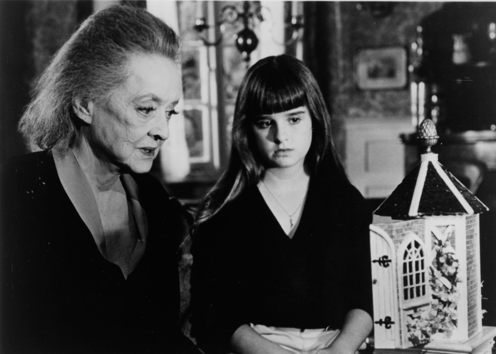 Bette Davis and Kyle Richards looks at a music box in a scene for the Walt Disney movie "The Watcher in the Woods" circa 1979.