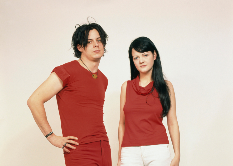 Meg White along with her then-husband Jack White in a studio portrait for their band White Stripes, circa 2002.