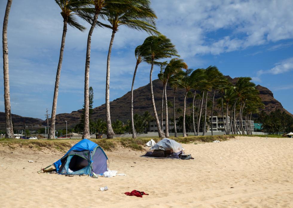 Tents belonging to homeless members of the population are seen at Maili Beach Park in Hawaii in 2014.