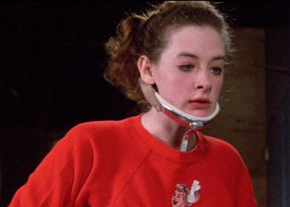 Joan Cusack in a neck brace.