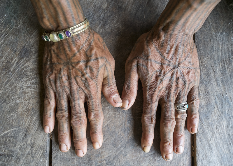 A pair of tattooed hands of someone from the Mentawai Tribe in Muara Siberut, West Sumatera.