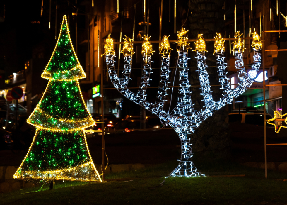 Beautiful street decorations representing a Christmas tree and a Hanukkah menorah