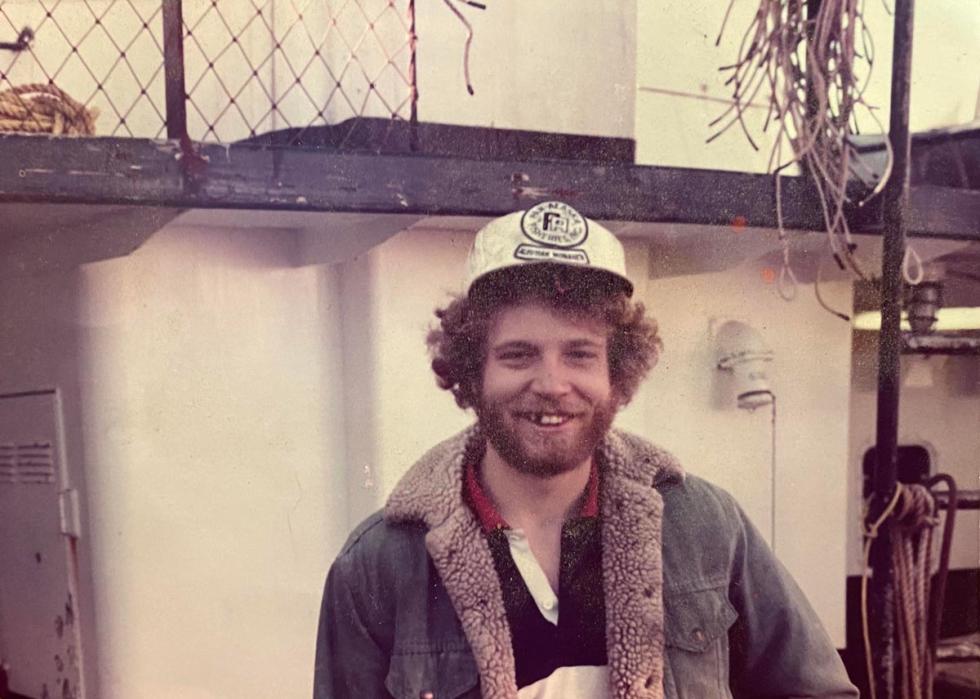 A young man smiling