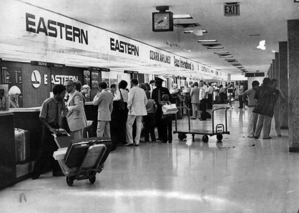 Black and white photo of the check-in counters at the San Antonio Airport