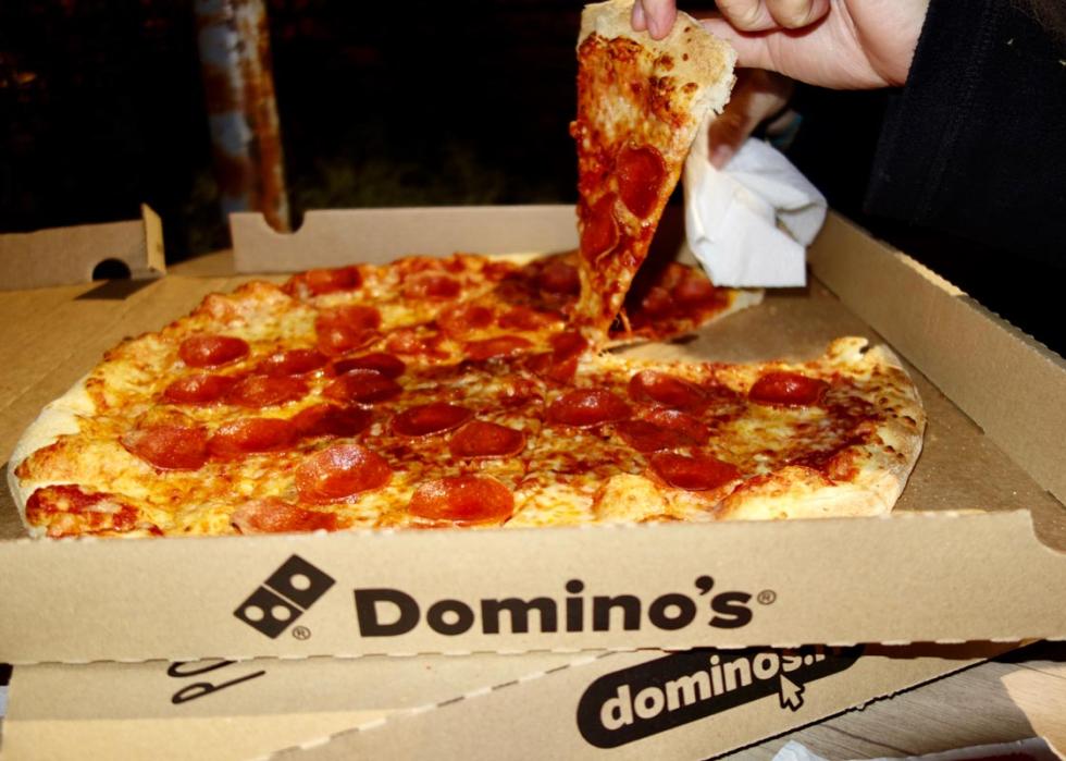 Dominoes pizza in a delivery box
