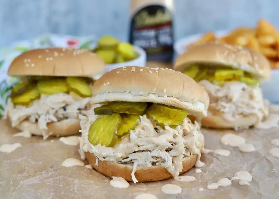 Pulled chicken sandwiches on roll.