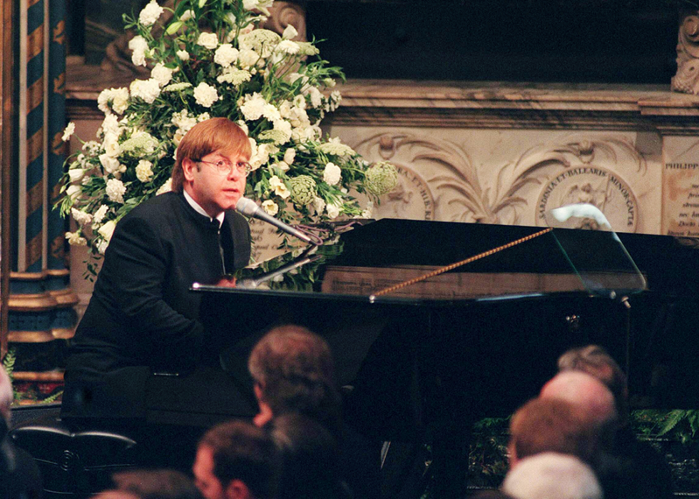 Elton John sings "Candle In The Wind" at the funeral of Diana, Princess of Wales.