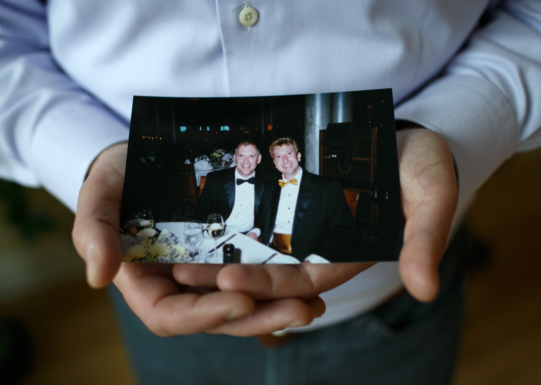 Jim Obergefell holds a photo of him and his late husband John Arthur