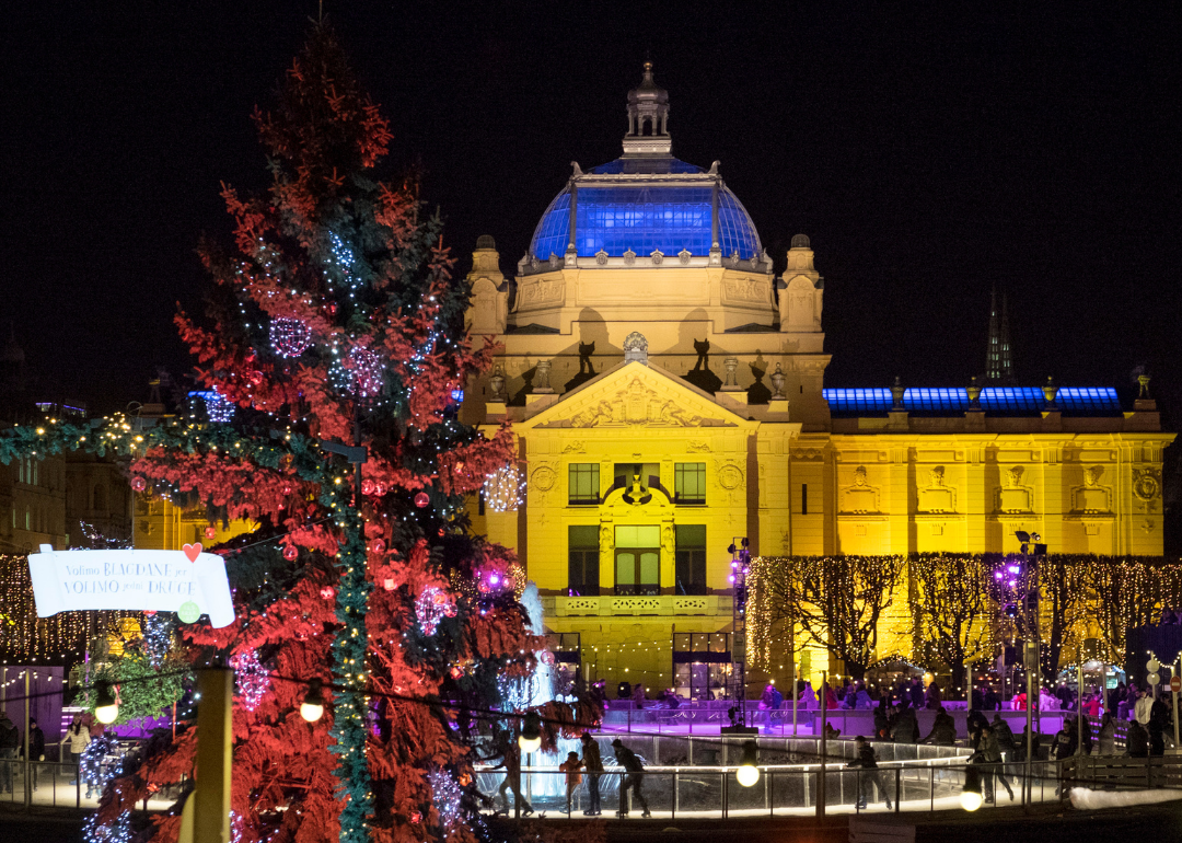 Locals skate at the Christmas ice rink in the city centre in Zagreb.