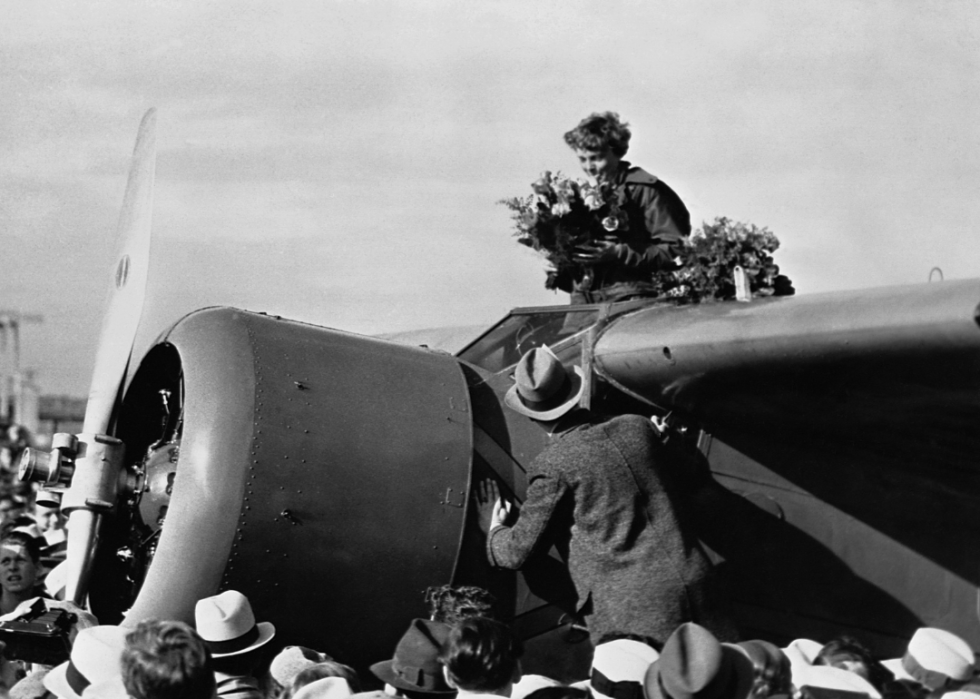 Amelia Earhart greeted by crowds on Oakland airstrip