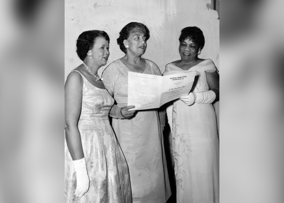 Dorothy Height, speaker at the National Negro Opera Foundation banquet, is shown with Dorothy Farrabee of Howard University and Mary Caldwell Dawson, founder and president of the National Negro Opera Foundation, in 1961.