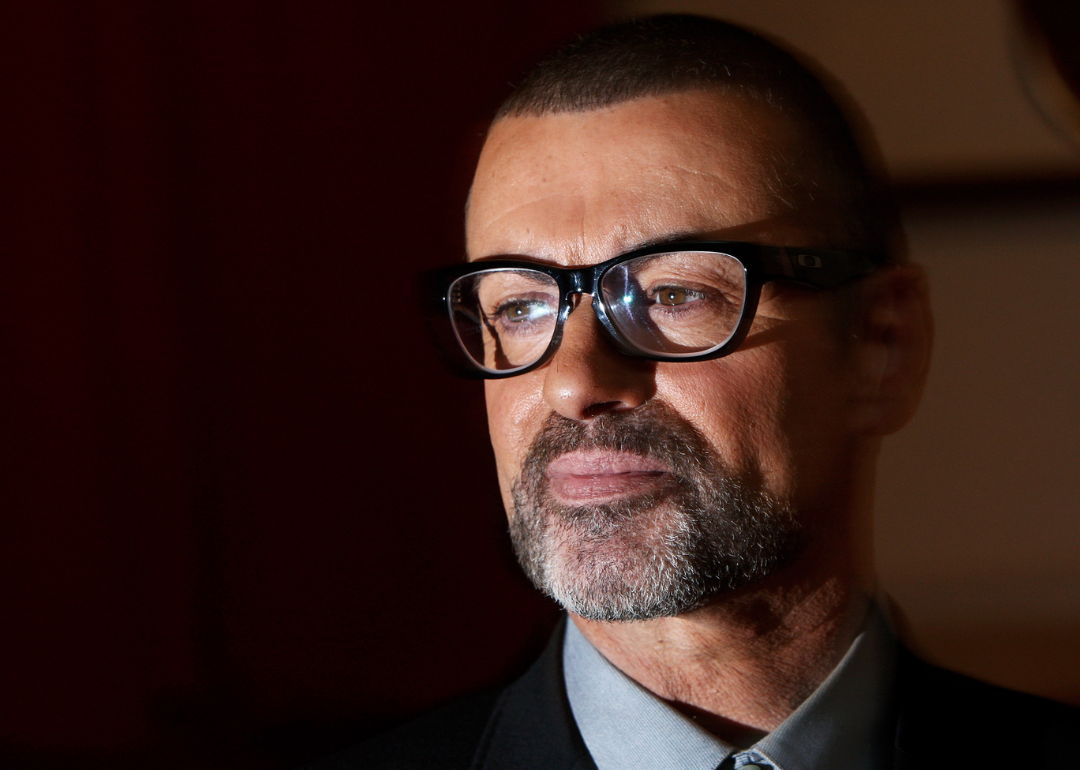 George Michael attends press conference.