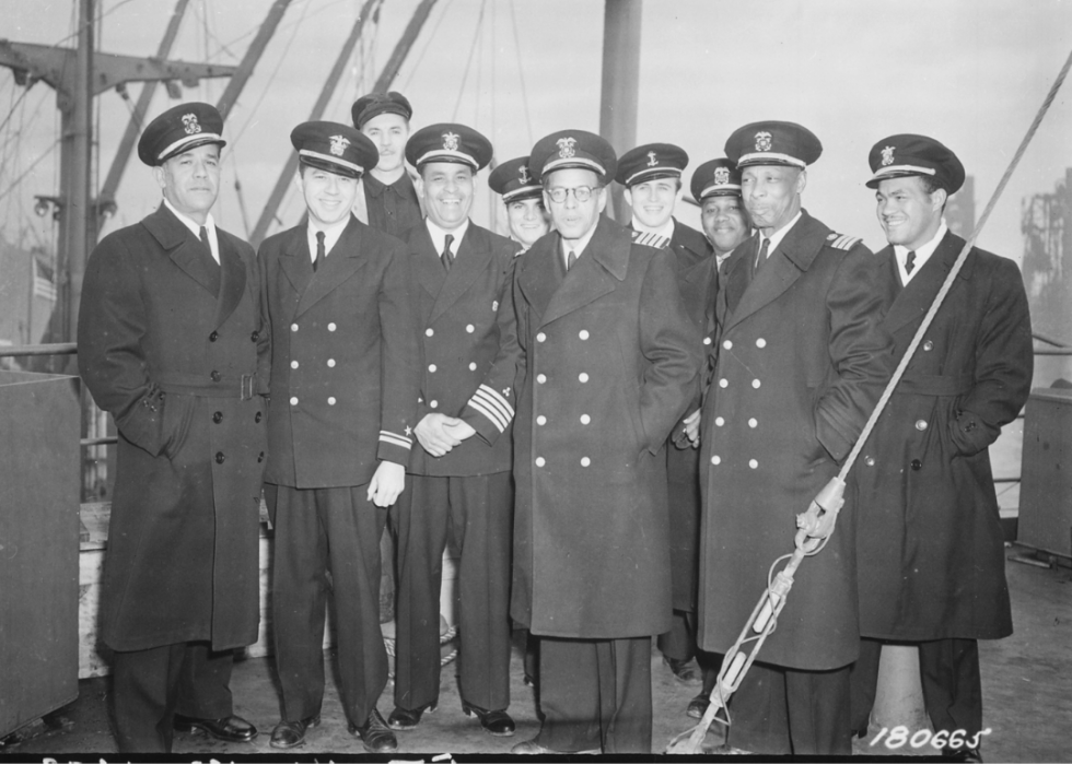  Captain and crew of the SS Booker T Washington on Feb. 8, 1943, with Captain Hugh Mulzac fourth from the left on the first row.