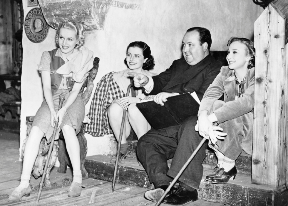Alfred Hitchcock with cast members on the set of ‘The Lady Vanishes’.
