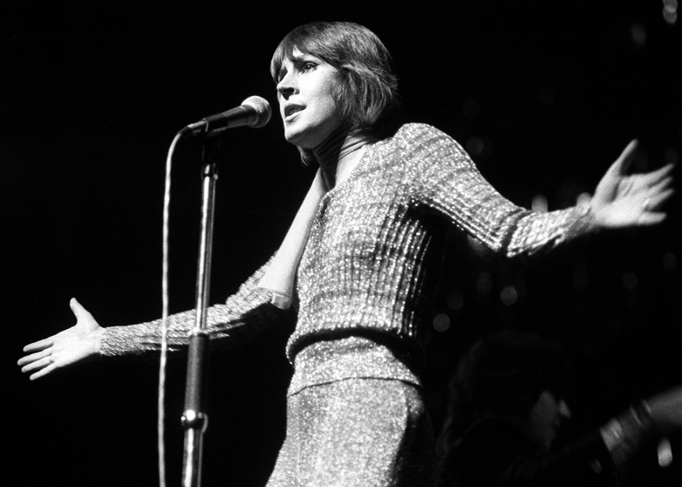 Helen Reddy performing on stage.