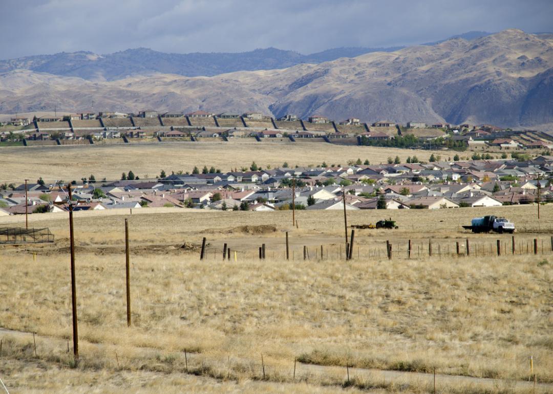 New residential housing developments against the Sierra Nevada foothills.