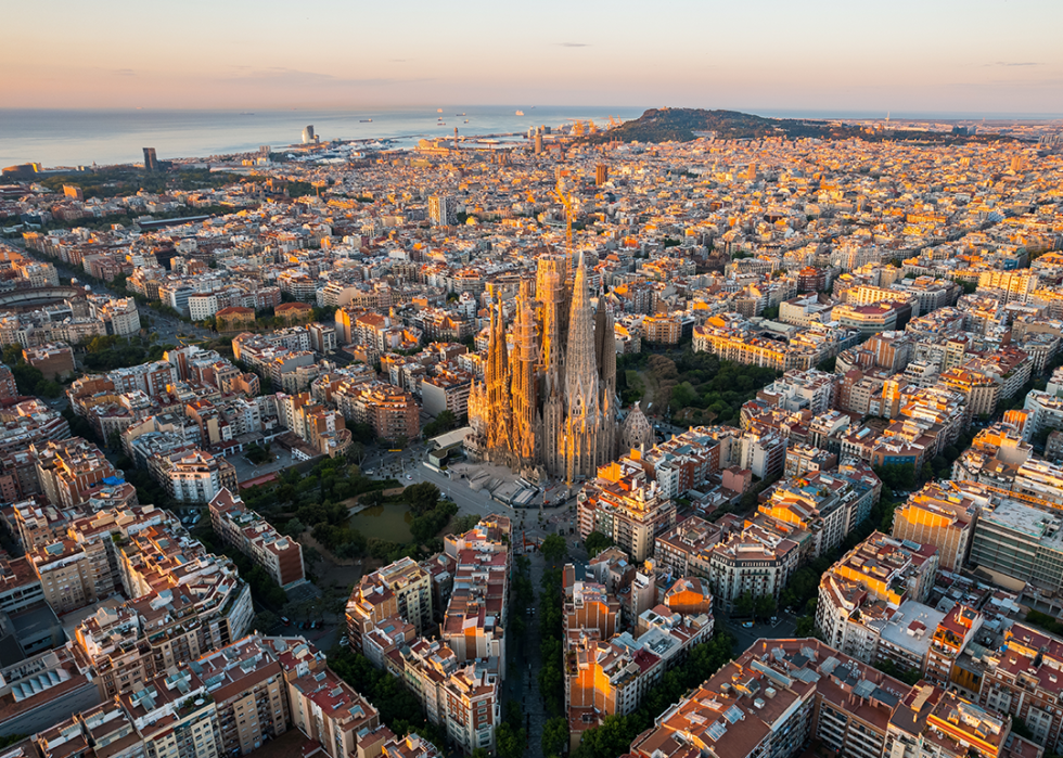 Aerial view of Barcelona with Sagrada Familia Basilica at sunrise.