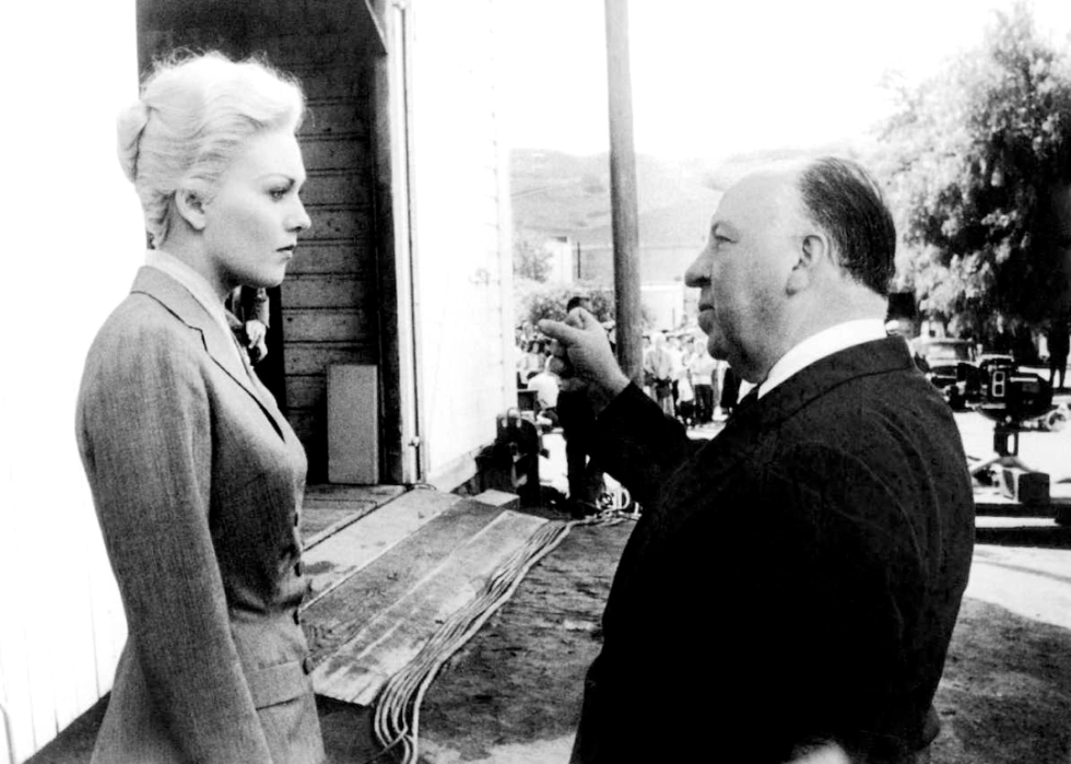 Kim Novak with Alfred Hitchcock on the set of ‘Vertigo’.