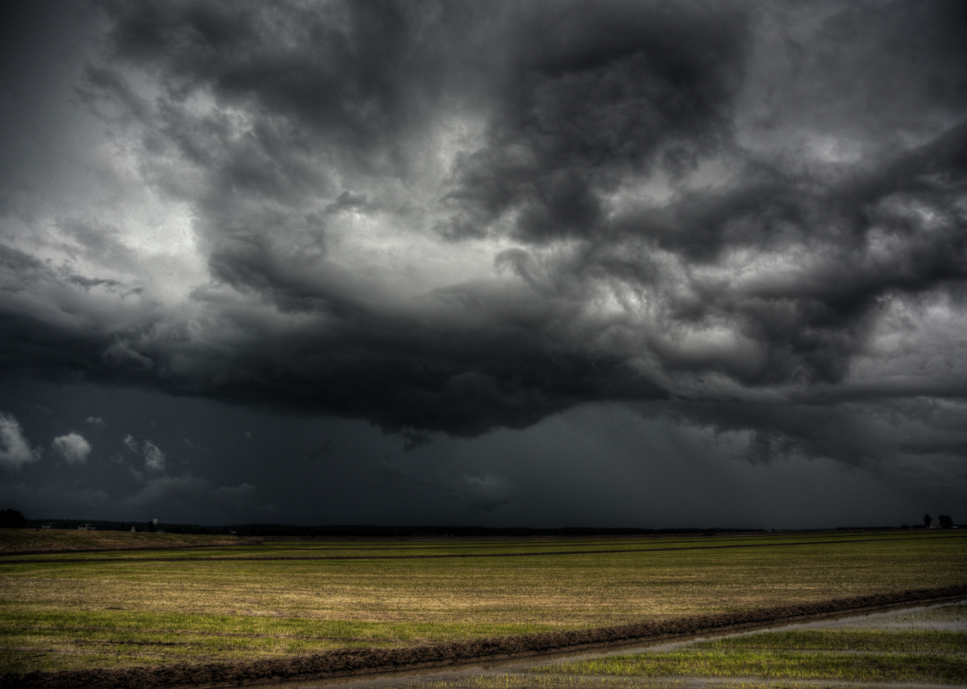 Storm over farmland.