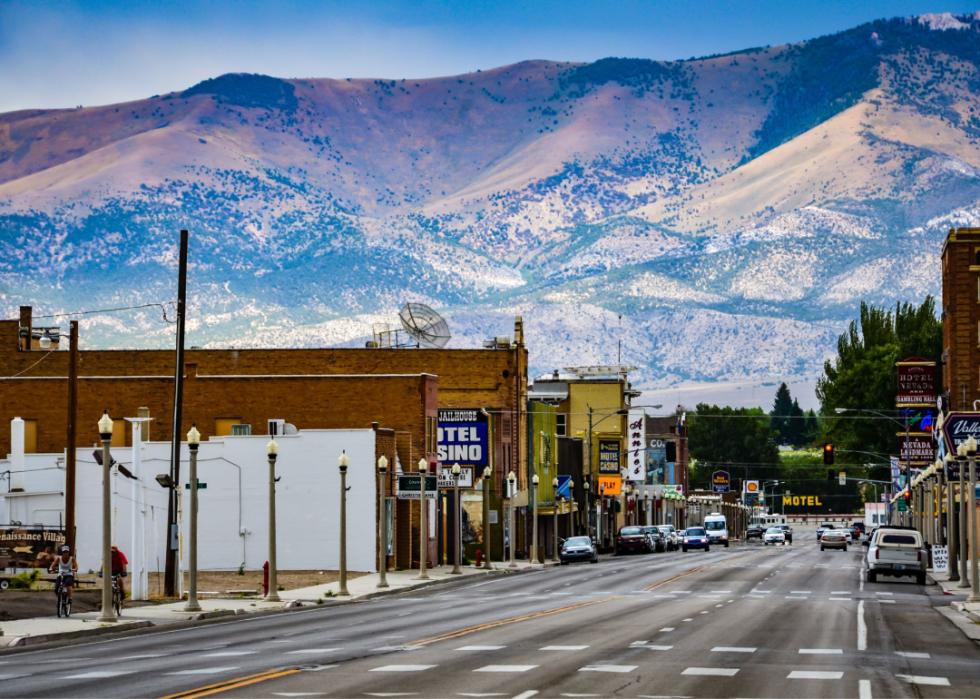 Route 50 in Ely with a mountain range in the background.